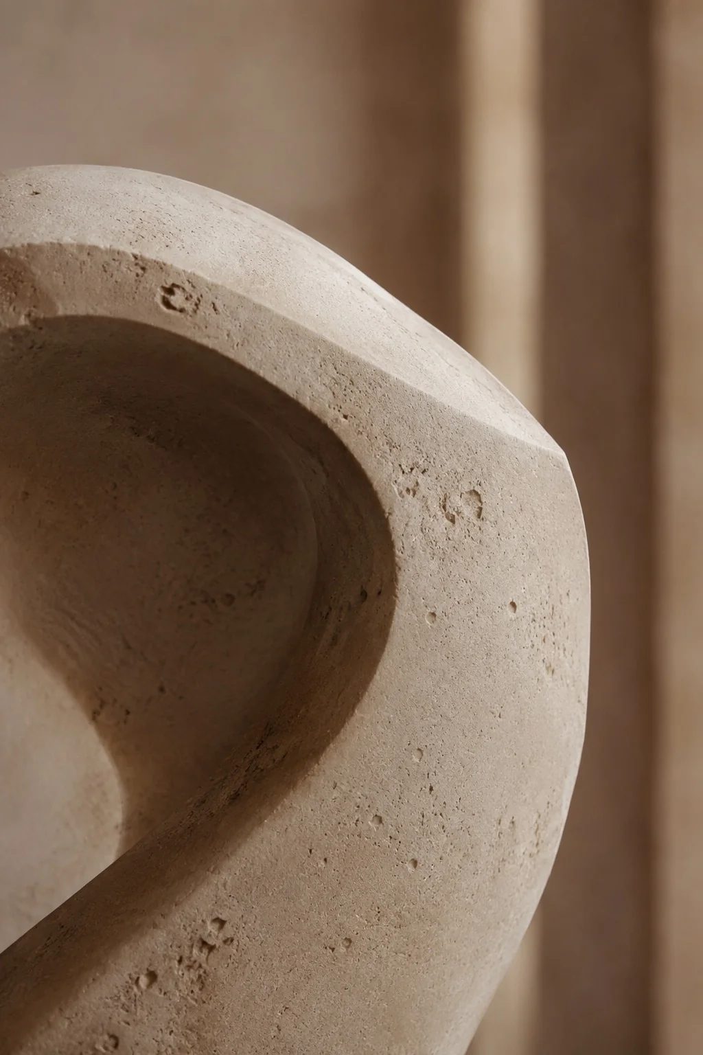 Abstract limestone form in soft light; illustrative image, not a patient result.